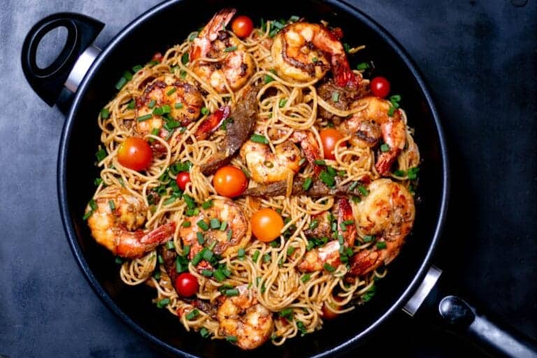 Garlic butter shrimp pasta with fresh parsley and red chili flakes
